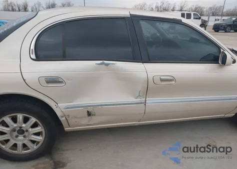 2000 Lincoln Continental z USA, uszkodzony, nr VIN 1LNHM97V3YY892072